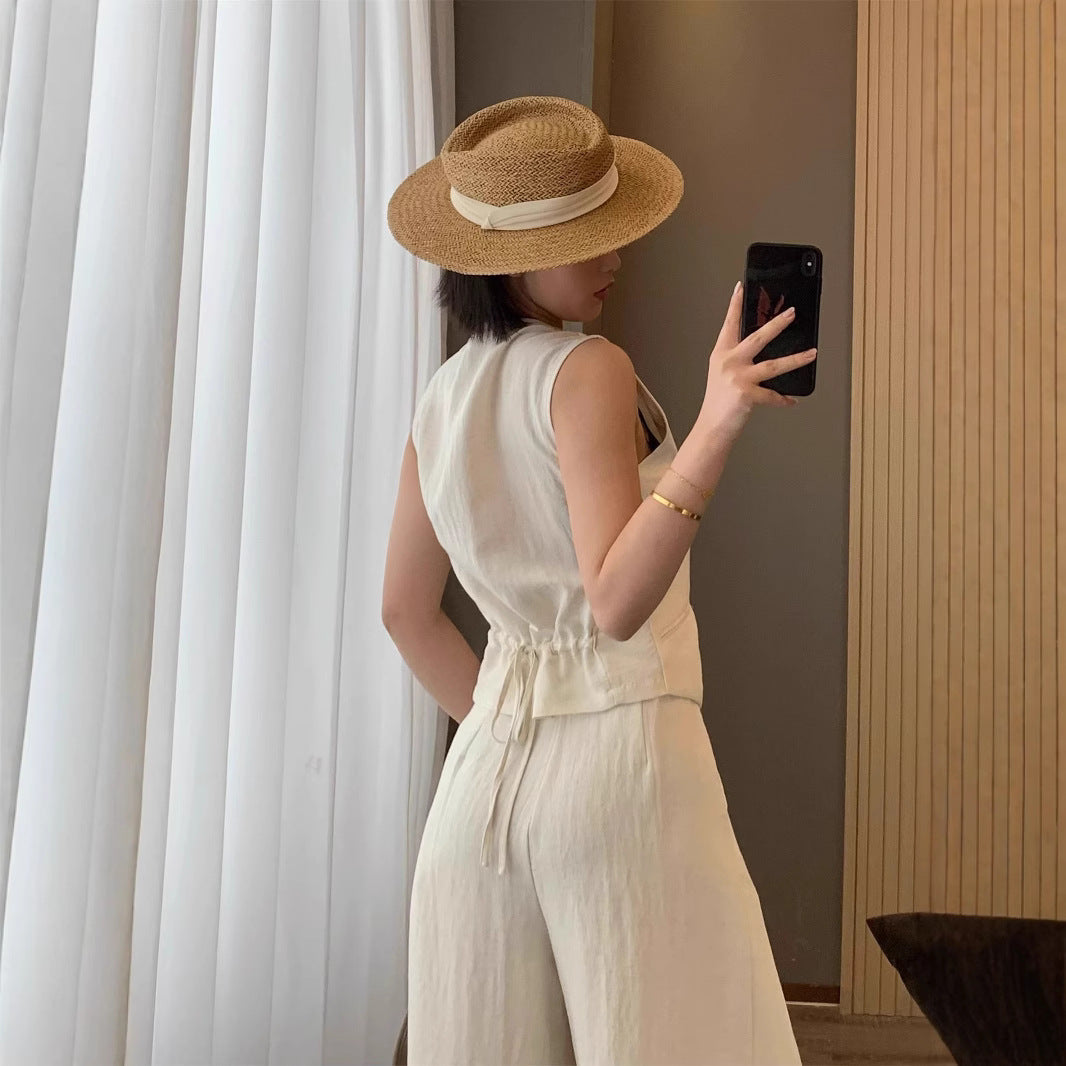 Tencel linen sleeveless high-end two-piece set for summer 2026, featuring a classic style with a vest and wide-leg pants.
