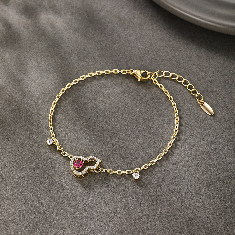 Xuping's New Fashionable Alloy Electroplated 14k Color Artificial Gemstone Hollow Gourd Bracelet, A Niche and Elegant Jewelry