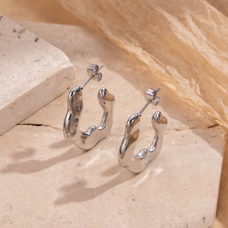 Titanium steel light luxury simple fashion irregular C-shaped metallic stainless steel high-end niche design earrings