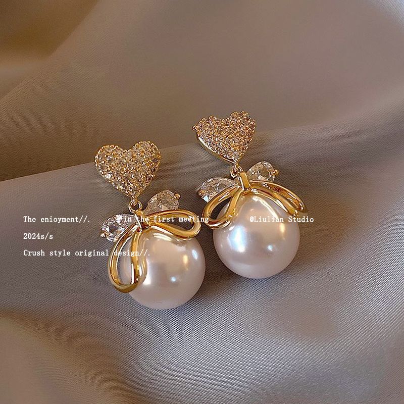 High-end imitation Baroque imitation pearl earrings niche light luxury bow diamond earrings 2025 new popular earrings