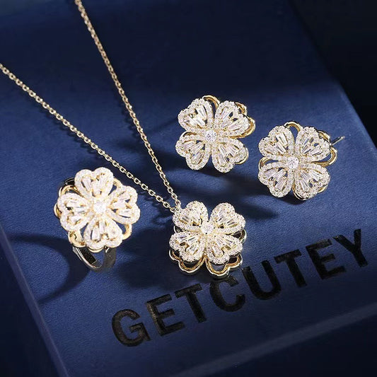 Internet celebrity's same style Shilairun rotatable four-leaf clover pendant 925 silver needle earrings ring rotating necklace set