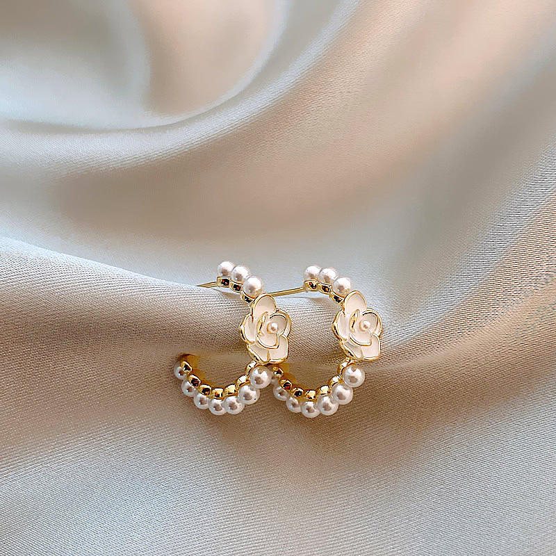 High-end imitation Baroque imitation pearl earrings niche light luxury bow diamond earrings 2025 new popular earrings