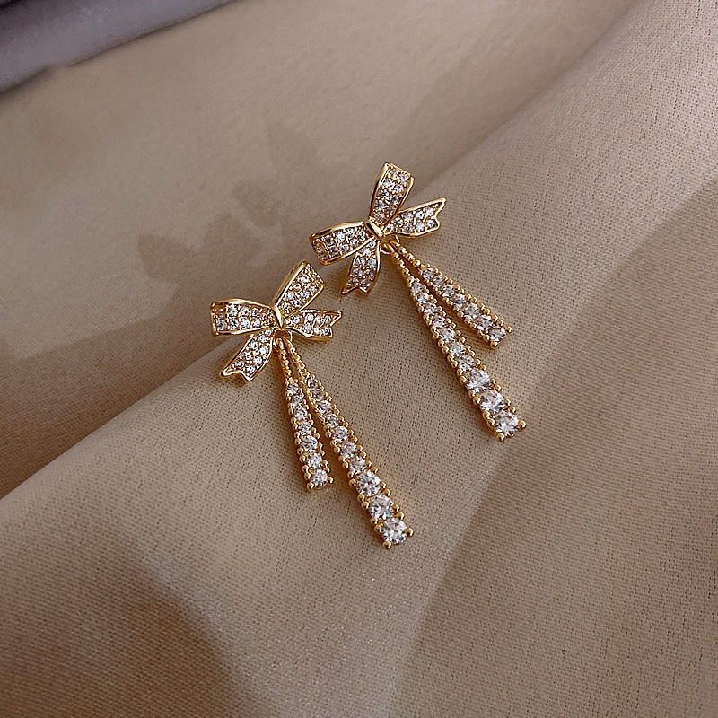 High-end autumn and winter Maillard retro oil drop earrings for women hot style earrings Internet celebrity round face slimming ear jewelry