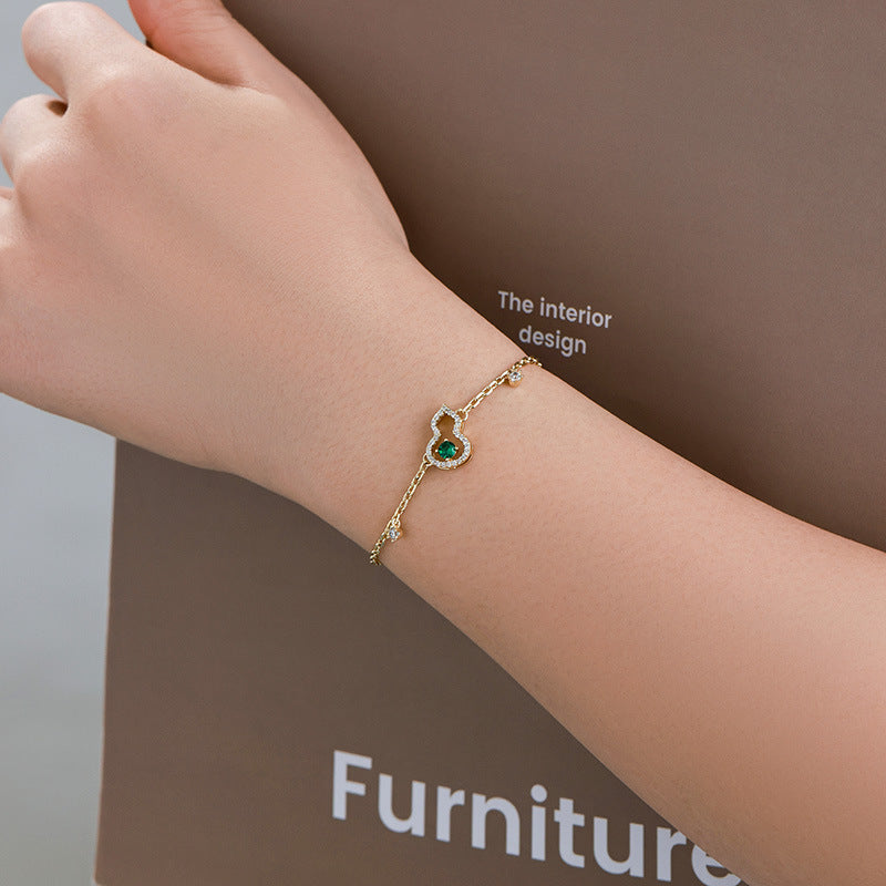 Xuping's New Fashionable Alloy Electroplated 14k Color Artificial Gemstone Hollow Gourd Bracelet, A Niche and Elegant Jewelry
