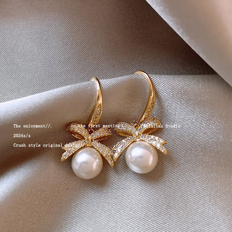 High-end imitation Baroque imitation pearl earrings niche light luxury bow diamond earrings 2025 new popular earrings
