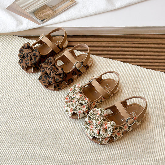 New Korean style cross-border girls' baby shoes, leopard print, bow, soft sole, 2026 summer versatile closed-toe sandals