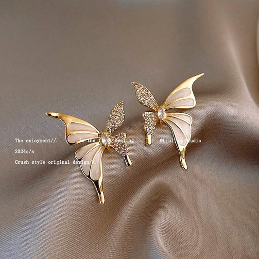 High-end imitation Baroque imitation pearl earrings niche light luxury bow diamond earrings 2025 new popular earrings