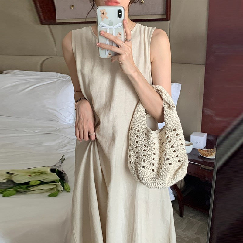 French-style sleeveless vest dress for women, new summer 2026 style, high-end backless loose apricot long dress