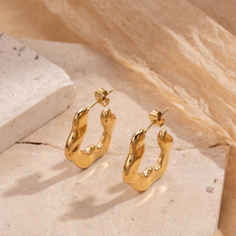 Titanium steel light luxury simple fashion irregular C-shaped metallic stainless steel high-end niche design earrings
