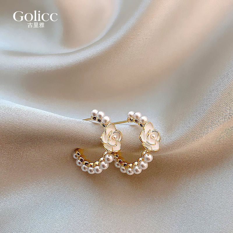 High-end autumn and winter Maillard retro oil drop earrings for women hot style earrings Internet celebrity round face slimming ear jewelry