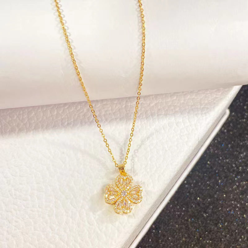 Internet celebrity's same style Shilairun rotatable four-leaf clover pendant 925 silver needle earrings ring rotating necklace set