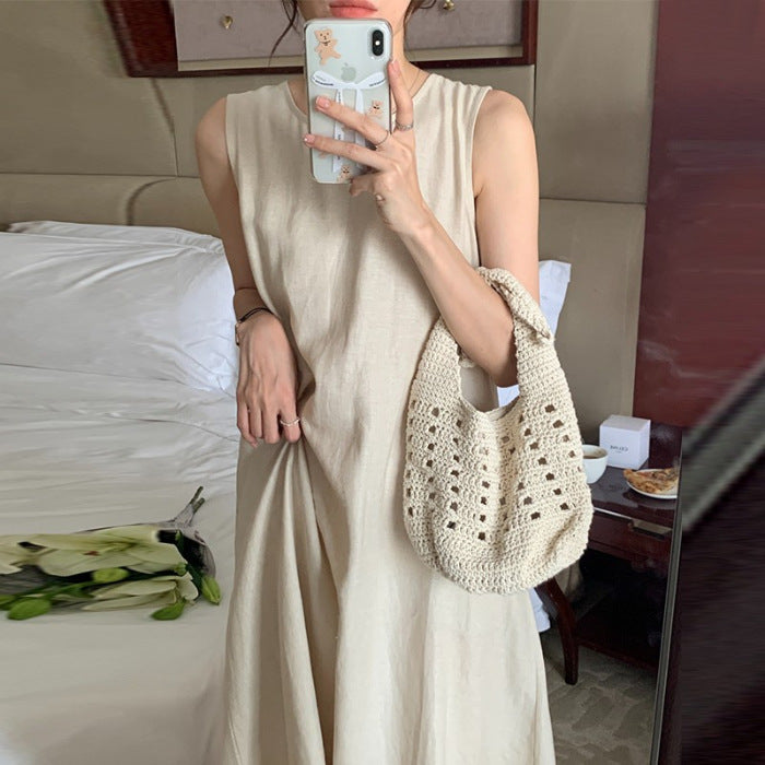 French-style sleeveless vest dress for women, new summer 2026 style, high-end backless loose apricot long dress