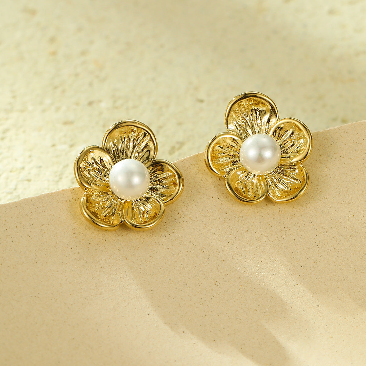 Cross-border new all-match high-grade titanium steel flower inlaid pearl earrings European and American exaggerated trend earrings