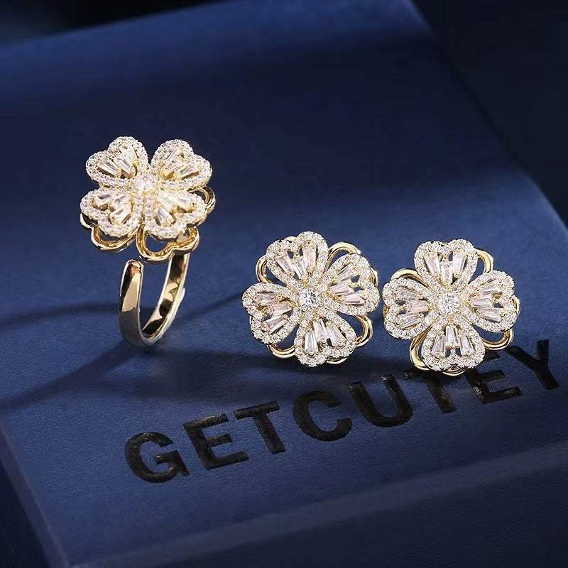 Internet celebrity's same style Shilairun rotatable four-leaf clover pendant 925 silver needle earrings ring rotating necklace set