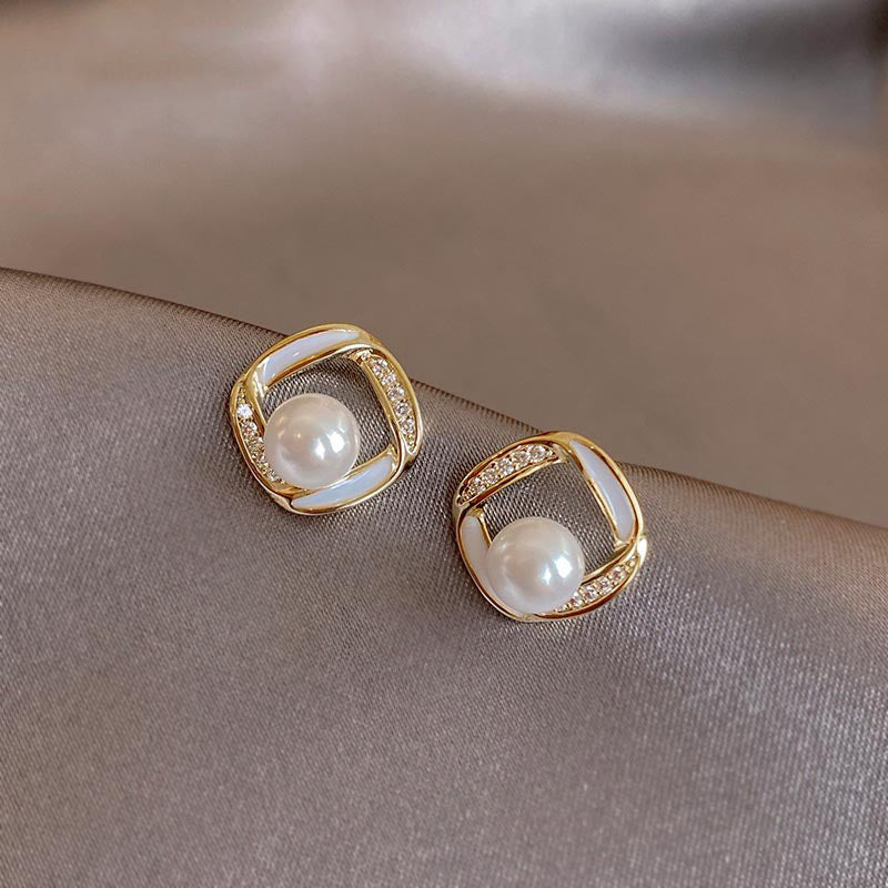 High-end imitation Baroque imitation pearl earrings niche light luxury bow diamond earrings 2025 new popular earrings