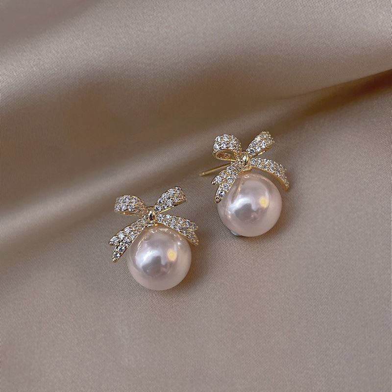 High-end imitation Baroque imitation pearl earrings niche light luxury bow diamond earrings 2025 new popular earrings