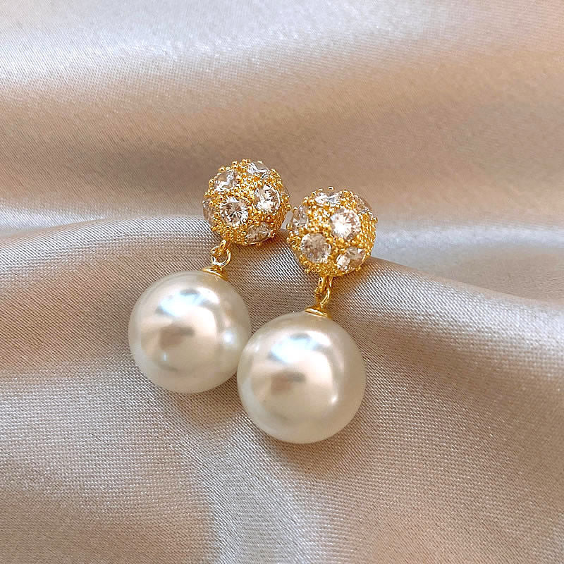 High-end imitation Baroque imitation pearl earrings niche light luxury bow diamond earrings 2025 new popular earrings