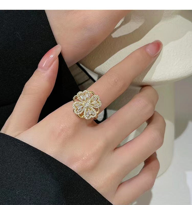 Internet celebrity's same style Shilairun rotatable four-leaf clover pendant 925 silver needle earrings ring rotating necklace set
