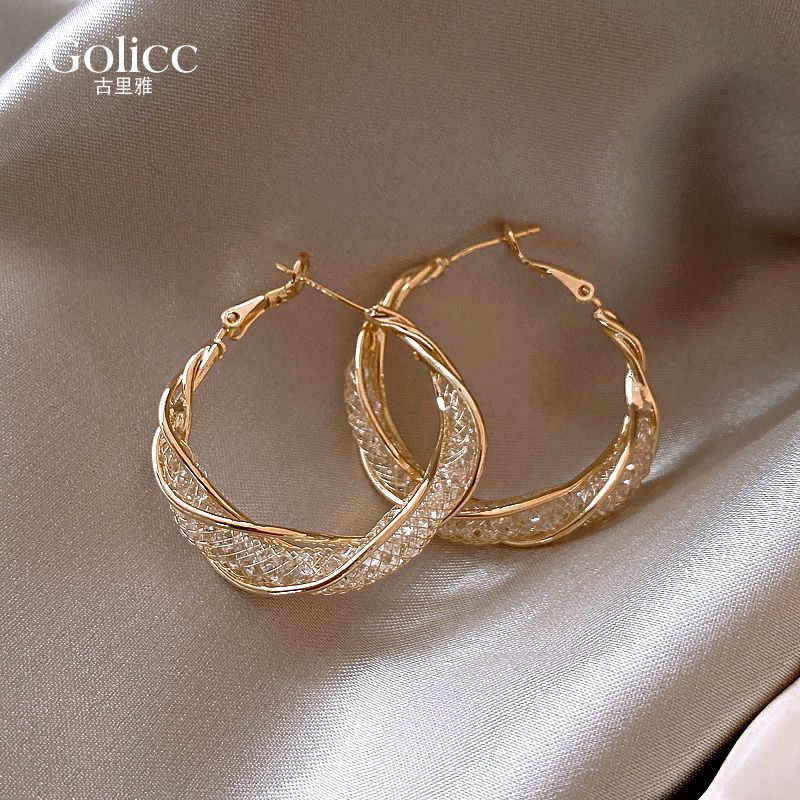 High-end autumn and winter Maillard retro oil drop earrings for women hot style earrings Internet celebrity round face slimming ear jewelry